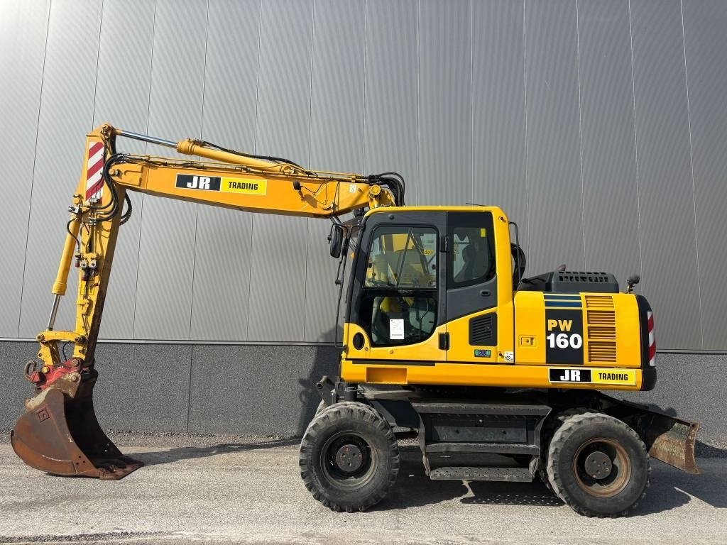 Komatsu PW 160 - Riteņu ekskavators: foto 1 Komatsu PW 160 - Riteņu ekskavators: foto 1