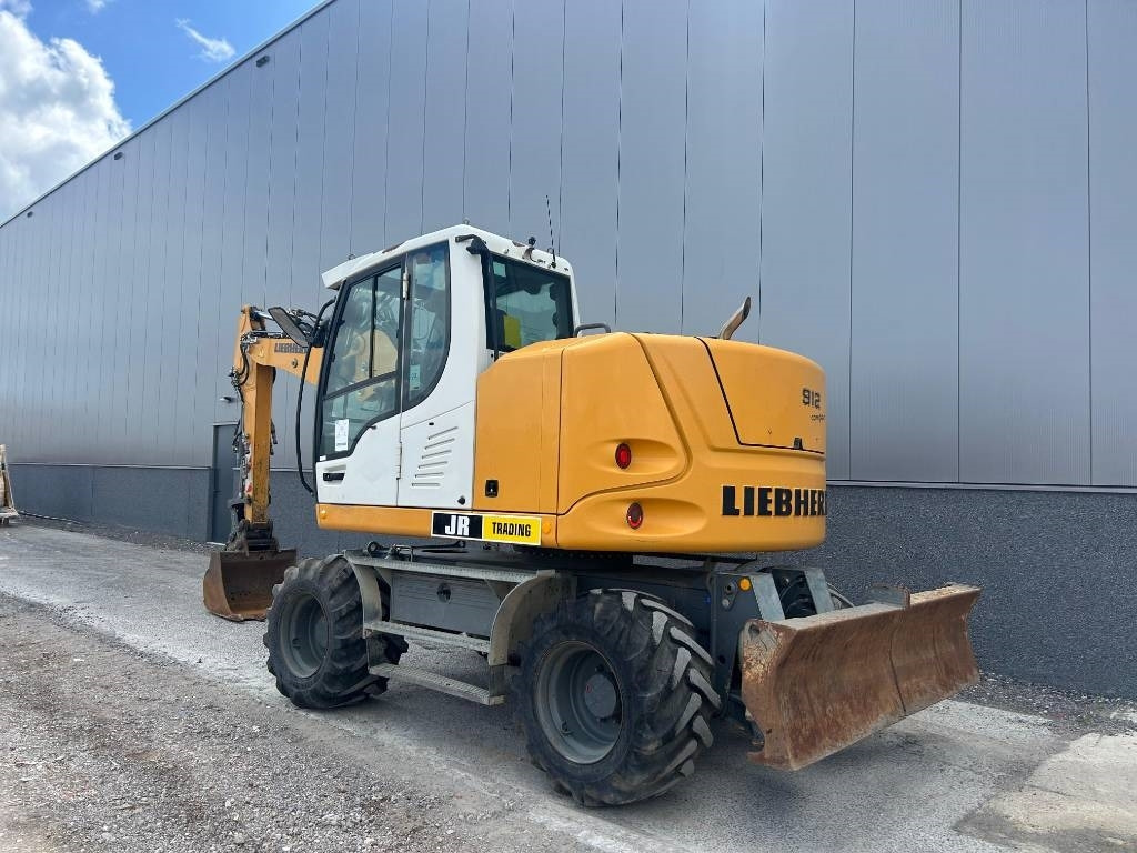 Liebherr A 912 Compact (2 Buckets) - Riteņu ekskavators: foto 3 Liebherr A 912 Compact (2 Buckets) - Riteņu ekskavators: foto 3