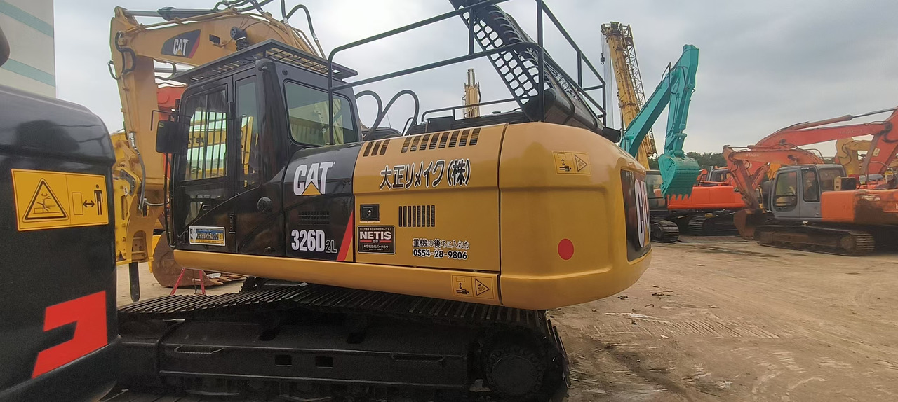 CATERPILLAR 326D2L - Ekskavators: foto 1 CATERPILLAR 326D2L - Ekskavators: foto 1