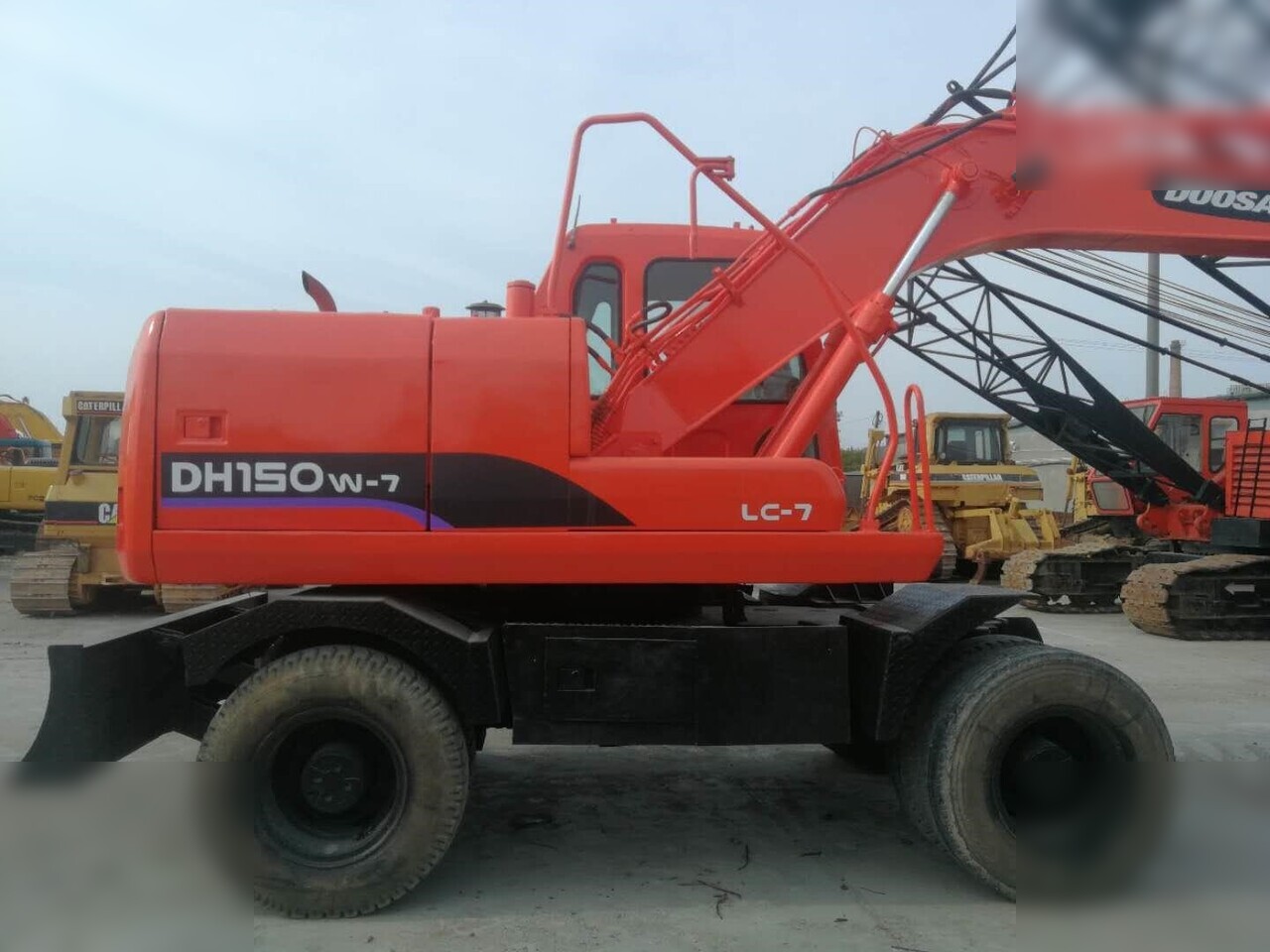 DOOSAN DH150W-7 - Riteņu ekskavators: foto 5 DOOSAN DH150W-7 - Riteņu ekskavators: foto 5