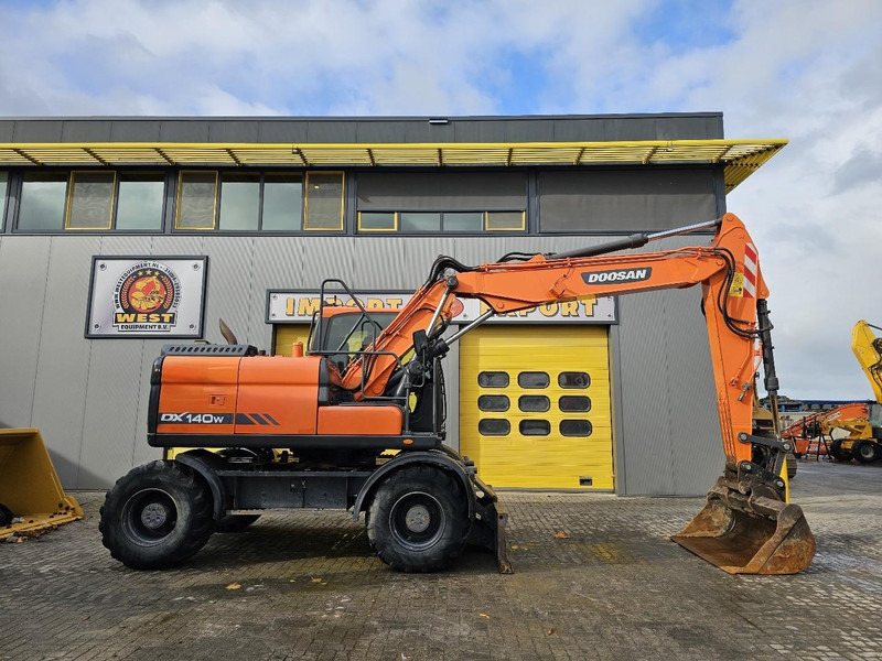 Doosan DX 140W - Riteņu ekskavators: foto 5 Doosan DX 140W - Riteņu ekskavators: foto 5
