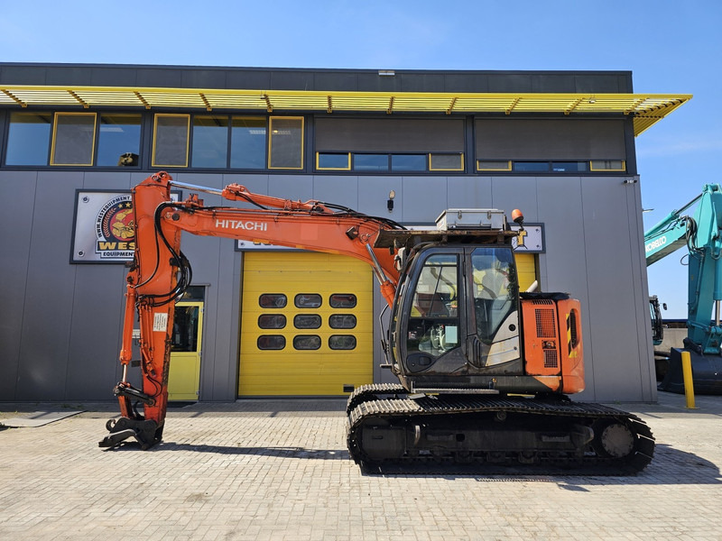 Hitachi ZX135US-5B - Kāpurķēžu ekskavators: foto 1 Hitachi ZX135US-5B - Kāpurķēžu ekskavators: foto 1
