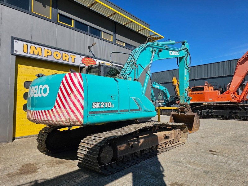 Kobelco SK210LC-9 - Kāpurķēžu ekskavators: foto 4 Kobelco SK210LC-9 - Kāpurķēžu ekskavators: foto 4