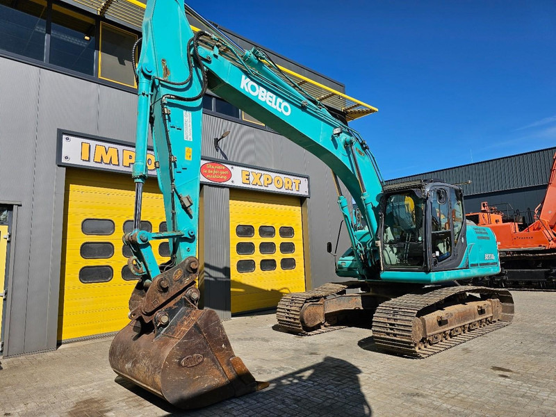 Kobelco SK210LC-9 - Kāpurķēžu ekskavators: foto 2 Kobelco SK210LC-9 - Kāpurķēžu ekskavators: foto 2