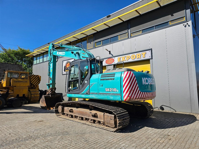 Kobelco SK210LC-9 - Kāpurķēžu ekskavators: foto 3 Kobelco SK210LC-9 - Kāpurķēžu ekskavators: foto 3