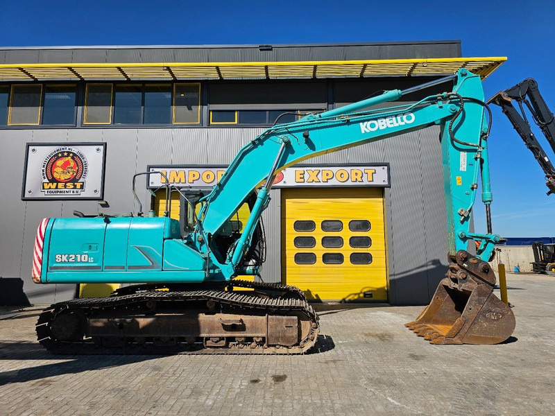 Kobelco SK210LC-9 - Kāpurķēžu ekskavators: foto 5 Kobelco SK210LC-9 - Kāpurķēžu ekskavators: foto 5
