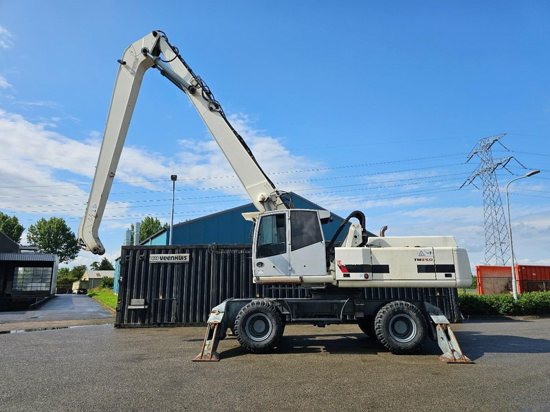 Terex TM350 - Atkritumu iekrāvējs: foto 4 Terex TM350 - Atkritumu iekrāvējs: foto 4