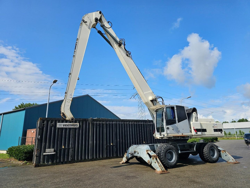 Terex TM350 - Atkritumu iekrāvējs: foto 5 Terex TM350 - Atkritumu iekrāvējs: foto 5