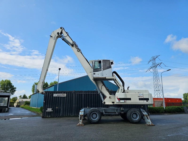 Terex TM350 - Atkritumu iekrāvējs: foto 1 Terex TM350 - Atkritumu iekrāvējs: foto 1