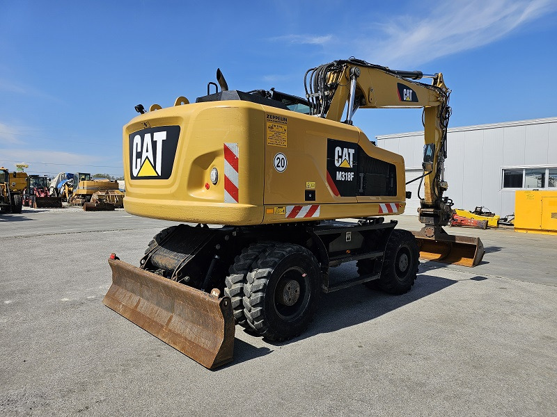 CATERPILLAR M318F - Riteņu ekskavators: foto 4 CATERPILLAR M318F - Riteņu ekskavators: foto 4