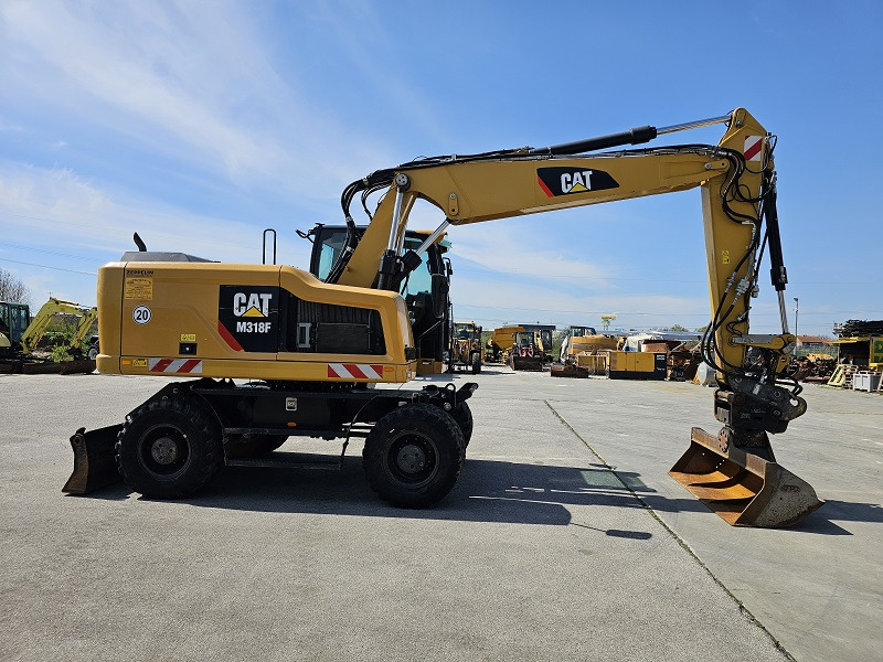 CATERPILLAR M318F - Riteņu ekskavators: foto 5 CATERPILLAR M318F - Riteņu ekskavators: foto 5