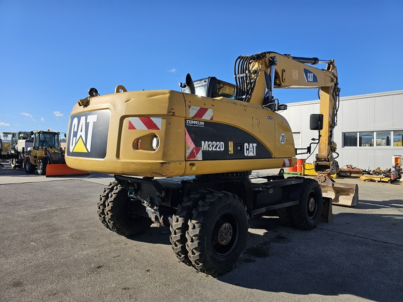 CATERPILLAR M322D - Riteņu ekskavators: foto 3 CATERPILLAR M322D - Riteņu ekskavators: foto 3