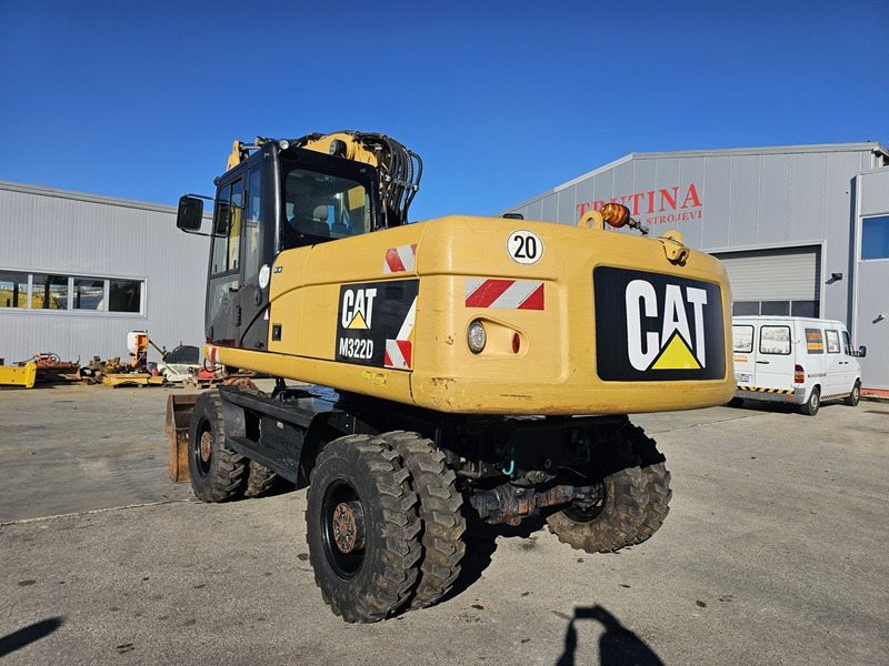CATERPILLAR M322D - Riteņu ekskavators: foto 2 CATERPILLAR M322D - Riteņu ekskavators: foto 2