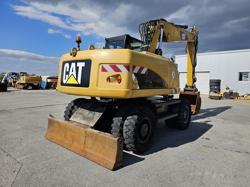 Caterpillar M315D - Riteņu ekskavators: foto 3 Caterpillar M315D - Riteņu ekskavators: foto 3