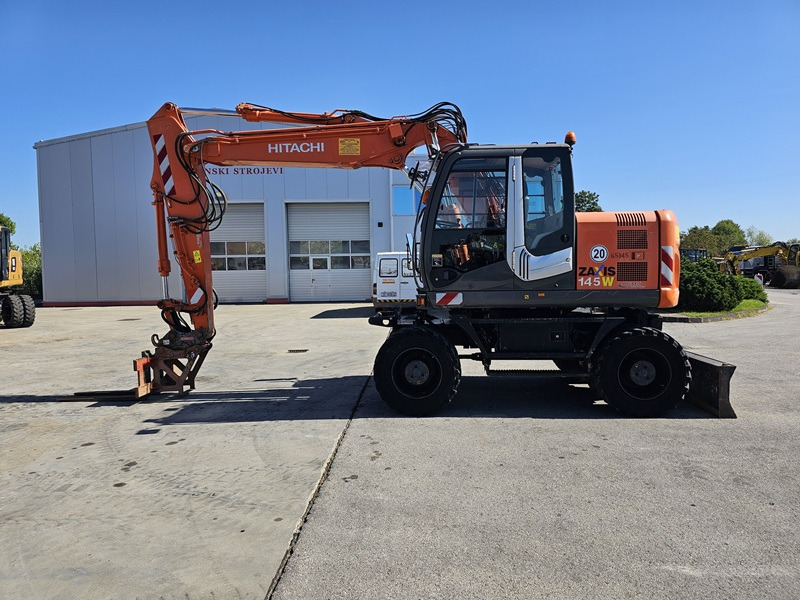 HITACHI ZX145W-3 - Riteņu ekskavators: foto 1 HITACHI ZX145W-3 - Riteņu ekskavators: foto 1