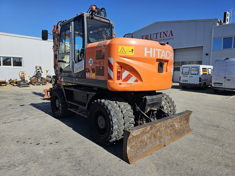 HITACHI ZX145W-3 - Riteņu ekskavators: foto 2 HITACHI ZX145W-3 - Riteņu ekskavators: foto 2
