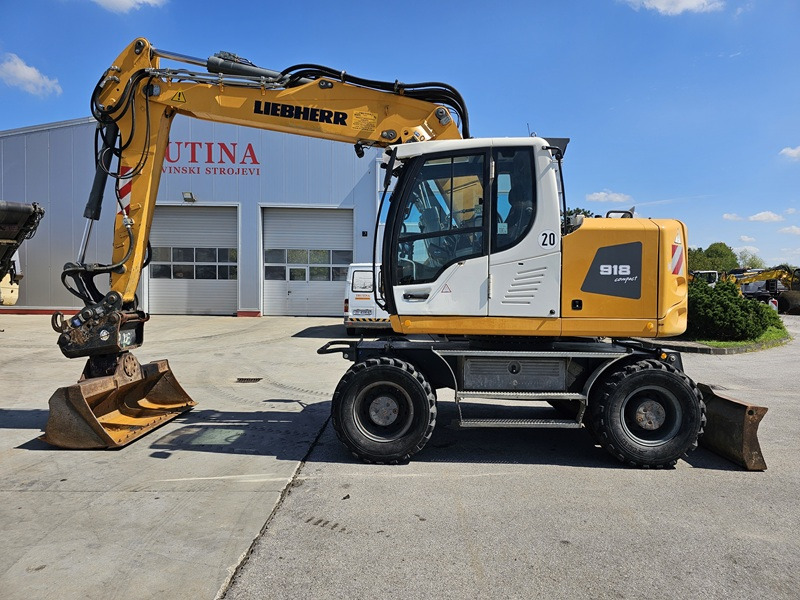LIEBHERR A918 Compact - Riteņu ekskavators: foto 1 LIEBHERR A918 Compact - Riteņu ekskavators: foto 1