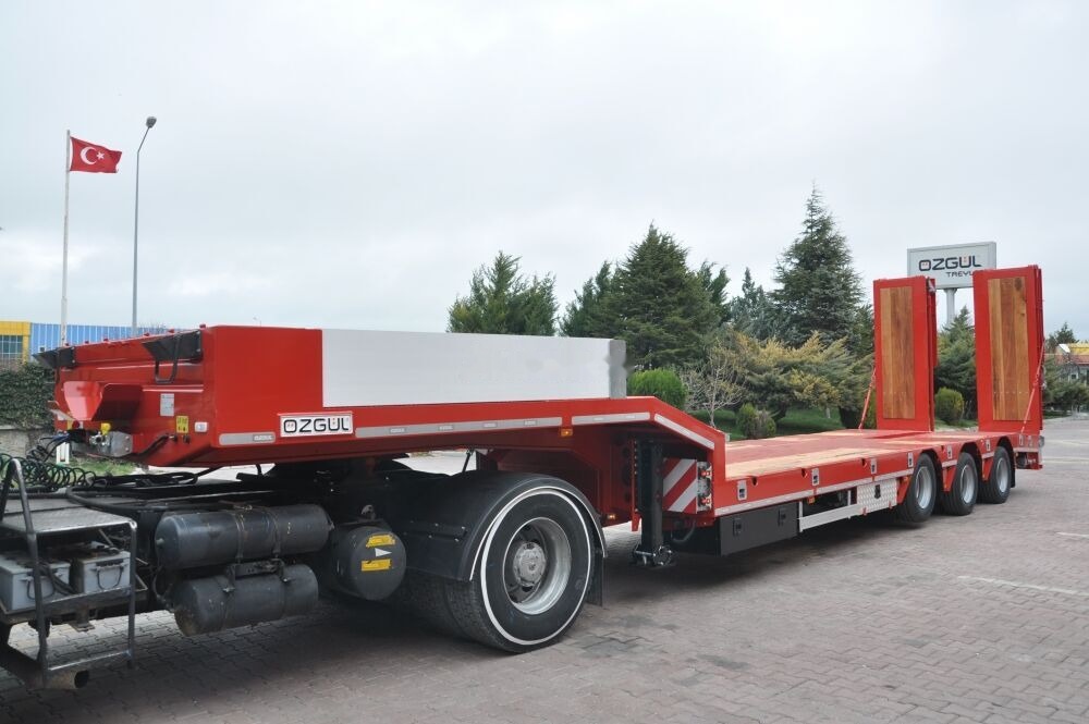 Özgül 3 AXE LOWBED SEMI TRAILER - Puspiekabe zema profila platforma: foto 1 Özgül 3 AXE LOWBED SEMI TRAILER - Puspiekabe zema profila platforma: foto 1