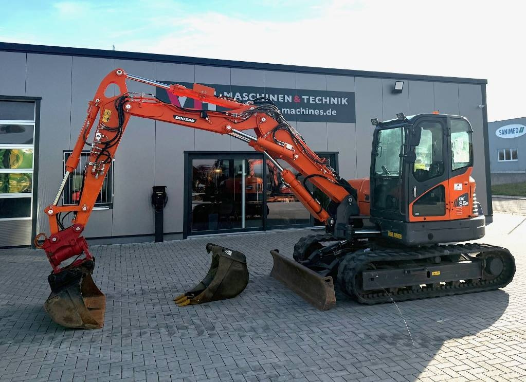 Doosan DX 85 R - Mini-ekskavators: foto 1 Doosan DX 85 R - Mini-ekskavators: foto 1