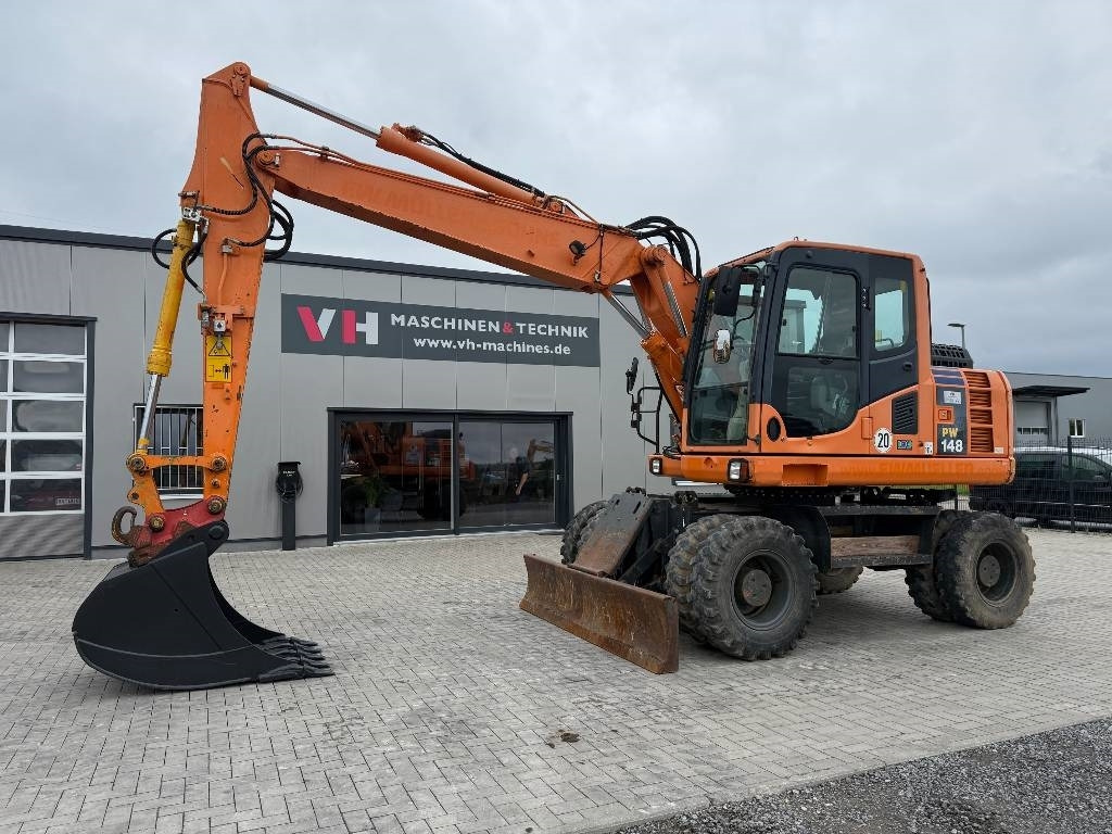 Komatsu PW 148-8 - Riteņu ekskavators: foto 1 Komatsu PW 148-8 - Riteņu ekskavators: foto 1