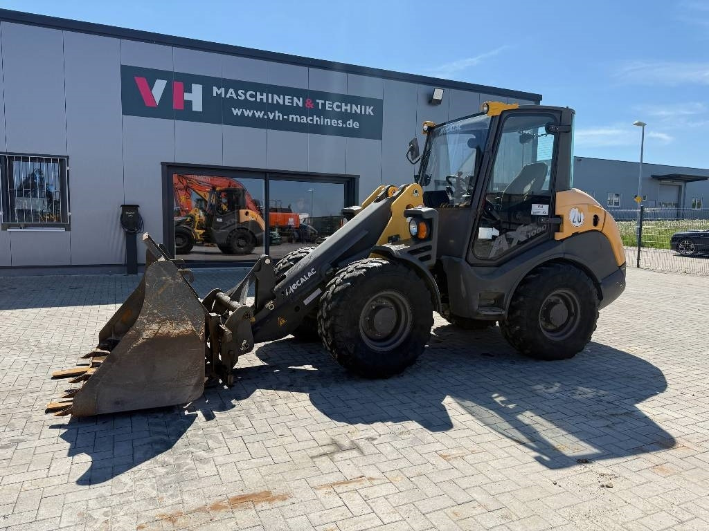 Mecalac AX 1000 - Riteņu iekrāvējs: foto 1 Mecalac AX 1000 - Riteņu iekrāvējs: foto 1