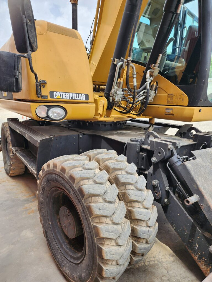 CAT M313D - Riteņu ekskavators: foto 4 CAT M313D - Riteņu ekskavators: foto 4
