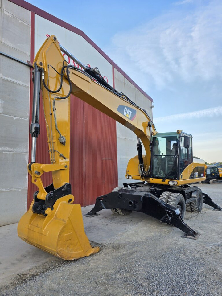 CAT M318D - Riteņu ekskavators: foto 3 CAT M318D - Riteņu ekskavators: foto 3