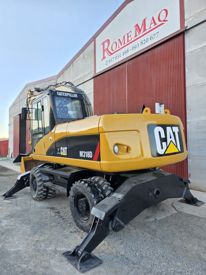 CAT M318D - Riteņu ekskavators: foto 2 CAT M318D - Riteņu ekskavators: foto 2