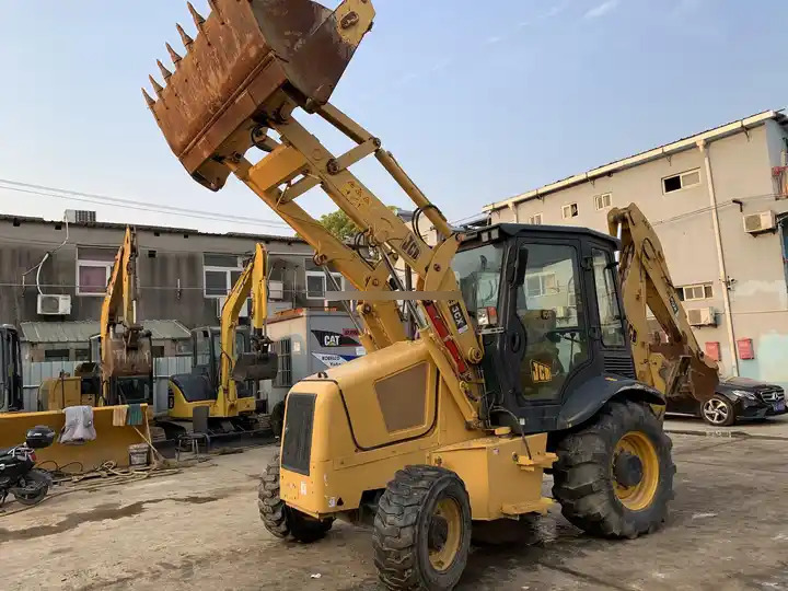 High Quality Original Uk JCB 3CX excavator used wheel loaders 7 ton backhoe loader with good working condition in stock for sale - Ekskavators-iekrāvējs: foto 3 High Quality Original Uk JCB 3CX excavator used wheel loaders 7 ton backhoe loader with good working condition in stock for sale - Ekskavators-iekrāvējs: foto 3