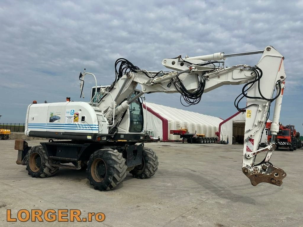 Hitachi ZX 140 W-3 - Riteņu ekskavators: foto 1 Hitachi ZX 140 W-3 - Riteņu ekskavators: foto 1