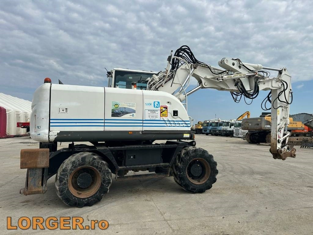 Hitachi ZX 140 W-3 - Riteņu ekskavators: foto 2 Hitachi ZX 140 W-3 - Riteņu ekskavators: foto 2