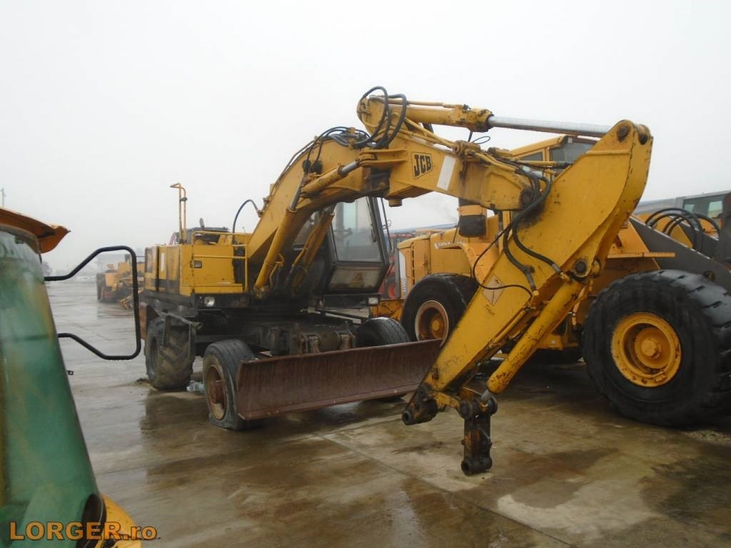 JCB JS 130 W - Riteņu ekskavators: foto 1 JCB JS 130 W - Riteņu ekskavators: foto 1