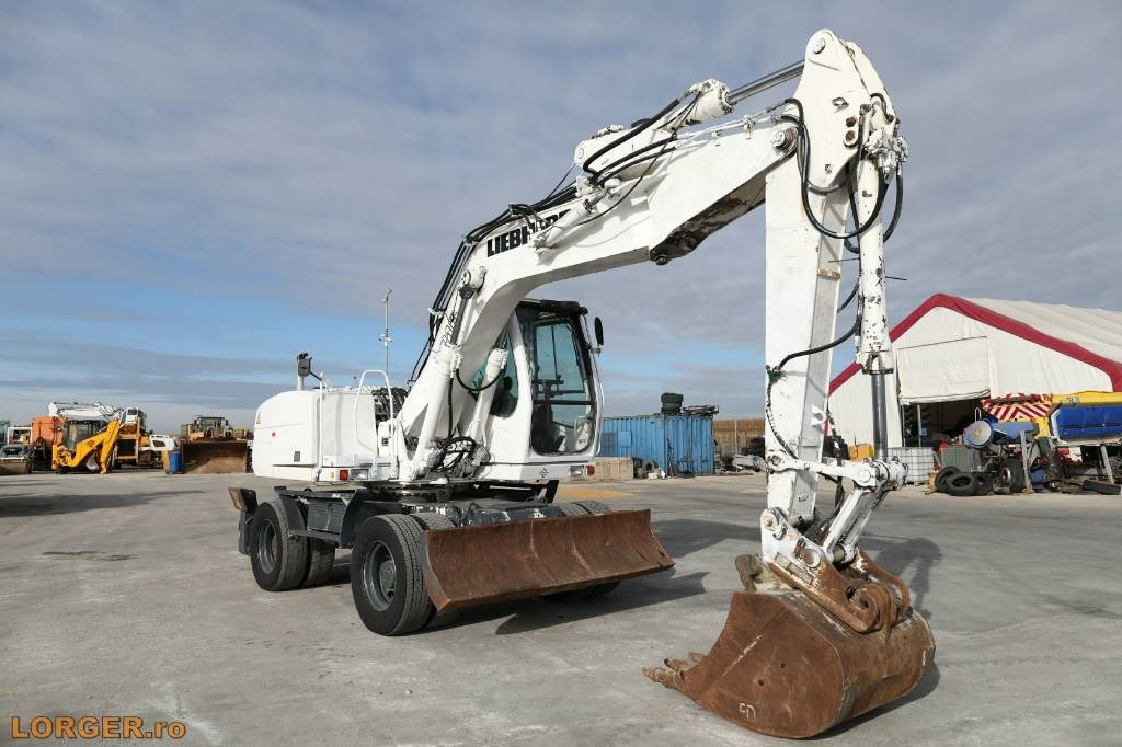 Liebherr A 316 Litronic - Riteņu ekskavators: foto 4 Liebherr A 316 Litronic - Riteņu ekskavators: foto 4