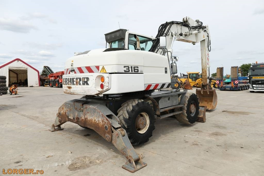 Liebherr A 316 Litronic - Riteņu ekskavators: foto 2 Liebherr A 316 Litronic - Riteņu ekskavators: foto 2