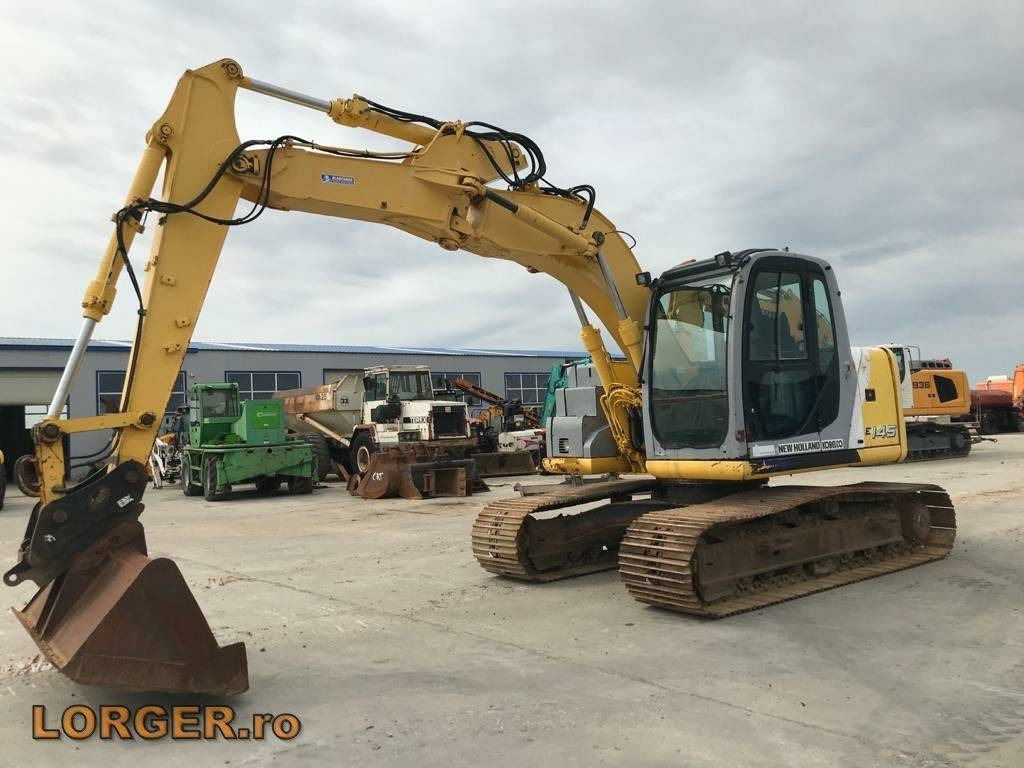 New Holland E 145 - Kāpurķēžu ekskavators: foto 1 New Holland E 145 - Kāpurķēžu ekskavators: foto 1