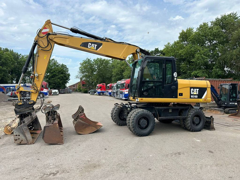 Cat M 316 D - Riteņu ekskavators: foto 2 Cat M 316 D - Riteņu ekskavators: foto 2