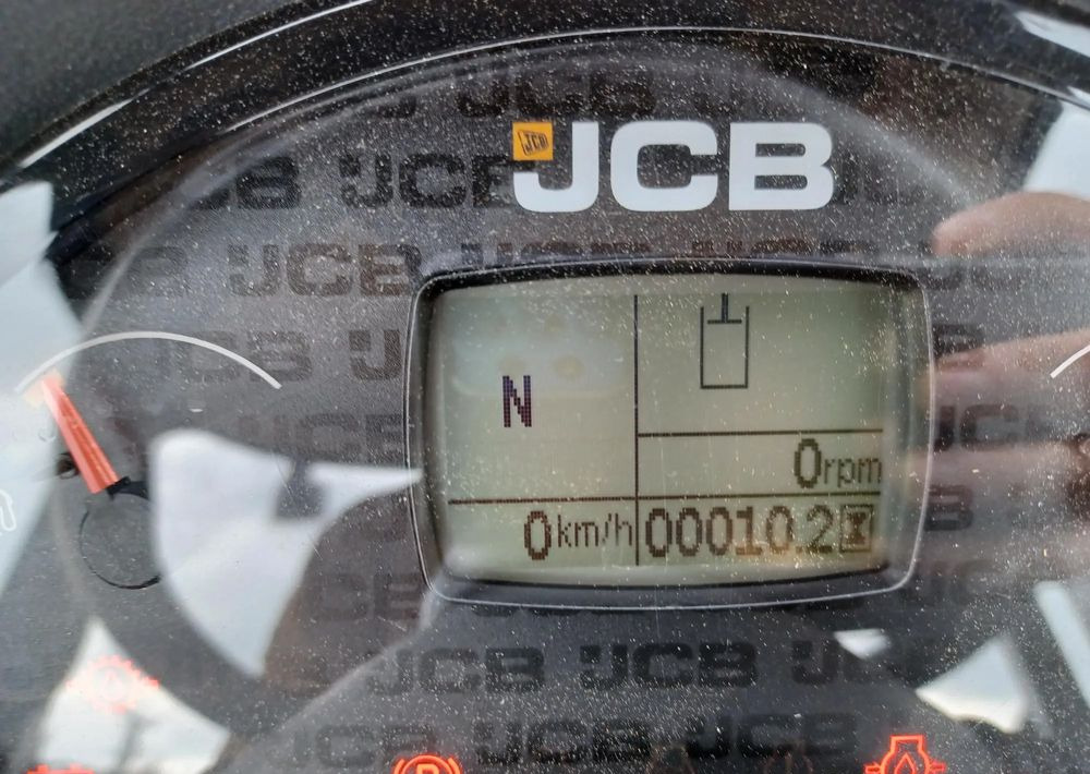 Riteņu iekrāvējs JCB 409: foto 6