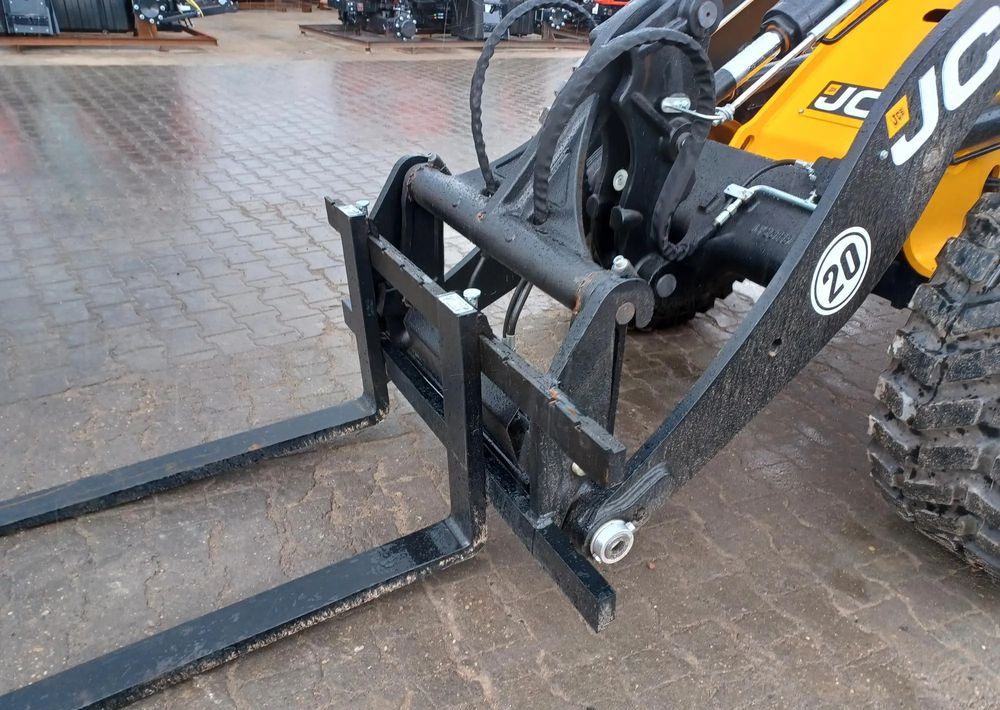 Riteņu iekrāvējs JCB 409: foto 11