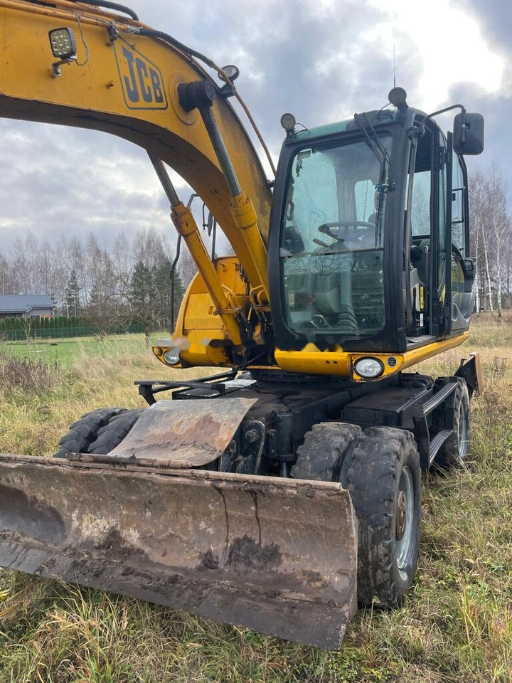 JCB JS 145 W - Riteņu ekskavators: foto 1 JCB JS 145 W - Riteņu ekskavators: foto 1
