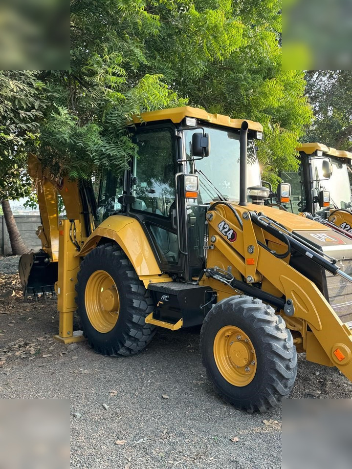 CATERPILLAR 424 - Ekskavators-iekrāvējs: foto 1 CATERPILLAR 424 - Ekskavators-iekrāvējs: foto 1