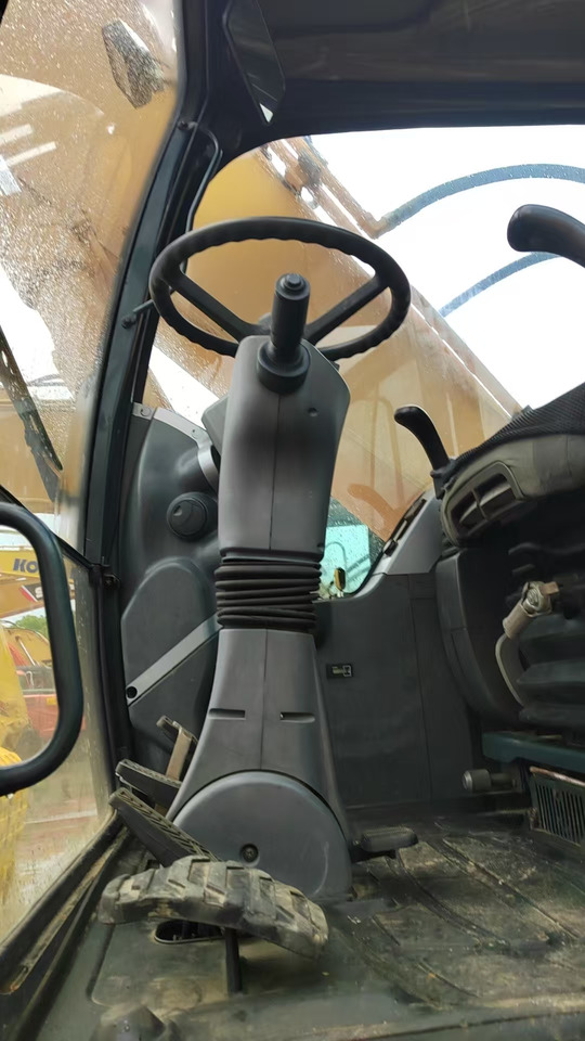 Hyundai 210 - Riteņu ekskavators: foto 2 Hyundai 210 - Riteņu ekskavators: foto 2