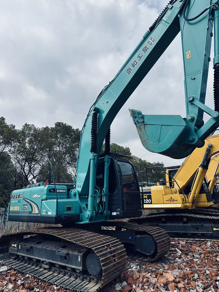 Kobelco SK200D - Kāpurķēžu ekskavators: foto 3 Kobelco SK200D - Kāpurķēžu ekskavators: foto 3