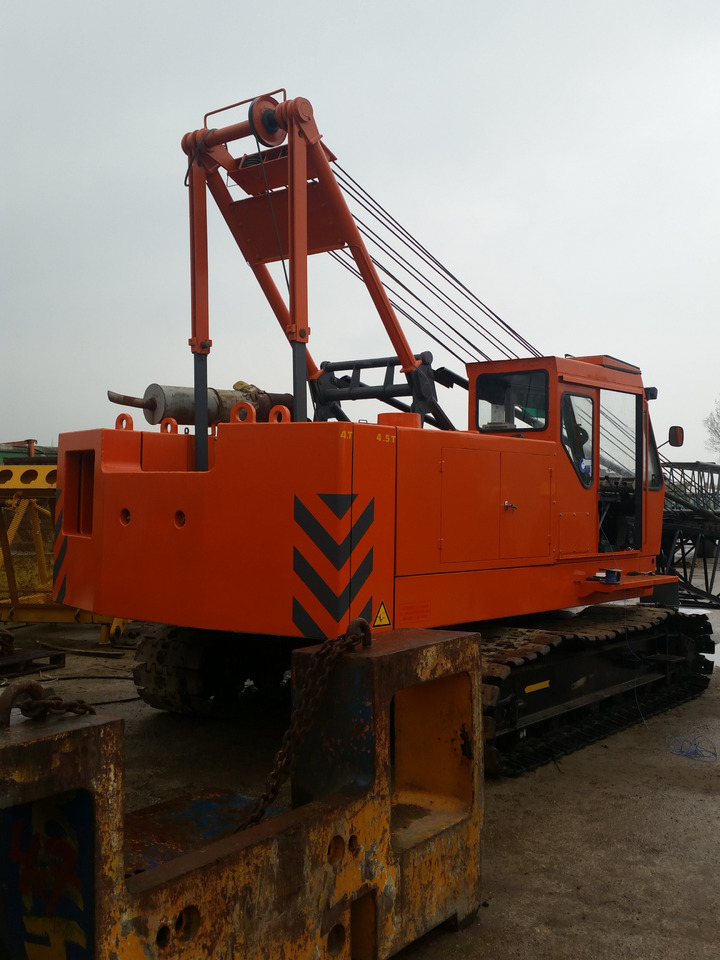 Hitachi KH-100 - Kāpurķēžu celtnis: foto 2 Hitachi KH-100 - Kāpurķēžu celtnis: foto 2