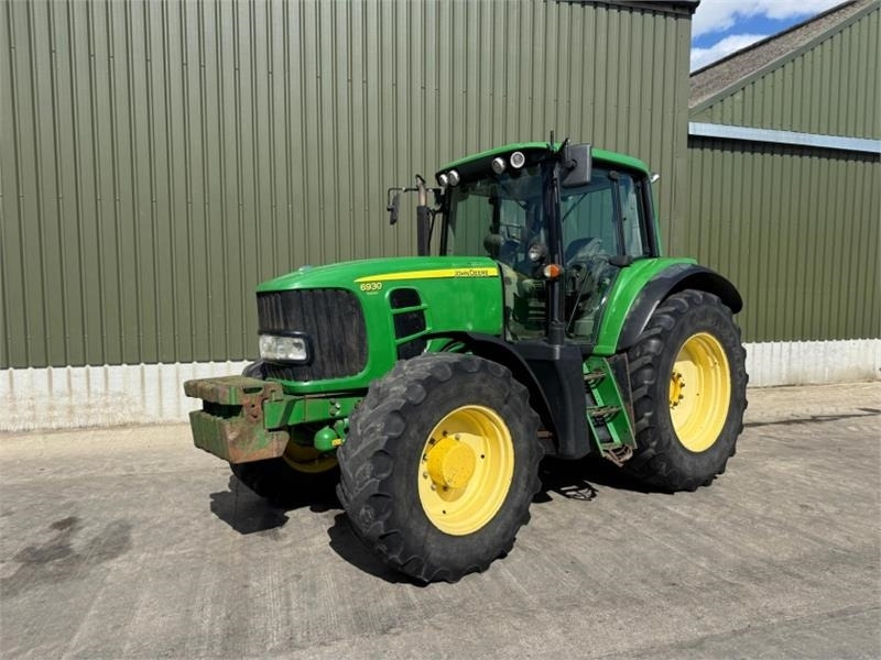 John Deere 6930 Premium - Traktors: foto 1 John Deere 6930 Premium - Traktors: foto 1