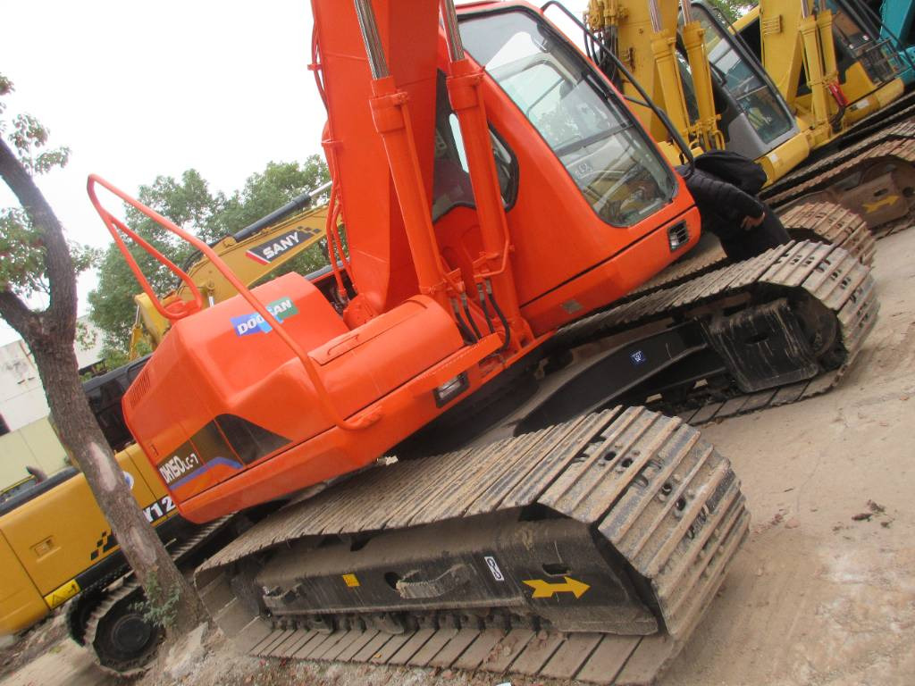 Doosan DH 150 LC-7 - Riteņu ekskavators: foto 3 Doosan DH 150 LC-7 - Riteņu ekskavators: foto 3