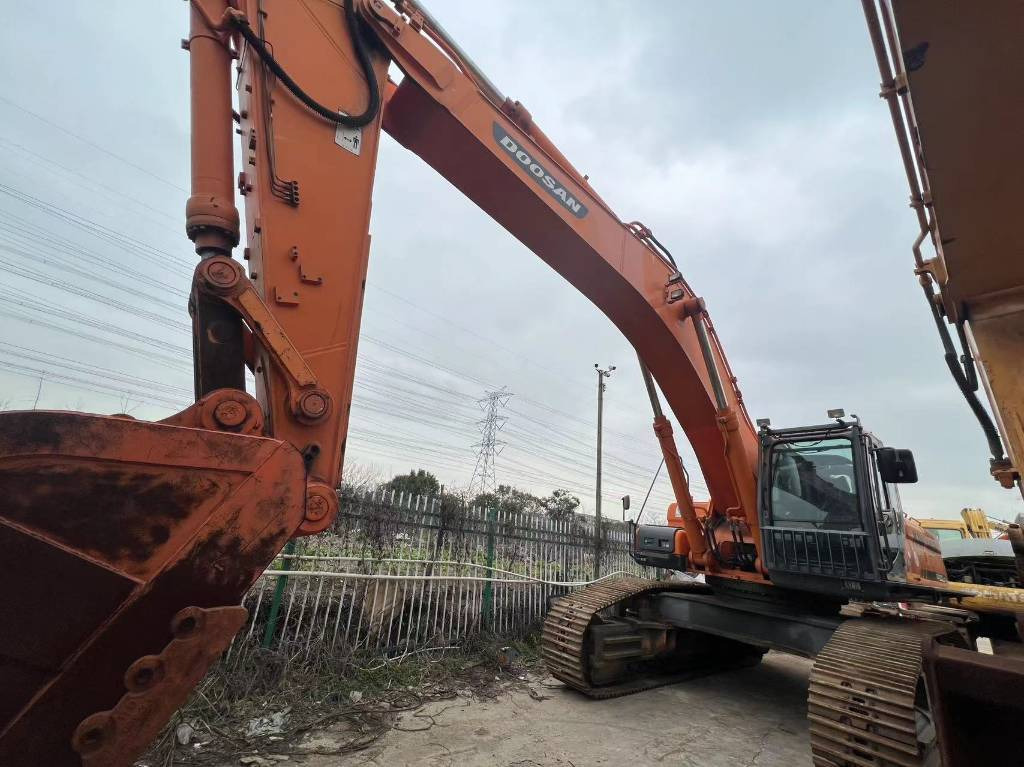 Doosan DX 500 LCA - Kāpurķēžu ekskavators: foto 1 Doosan DX 500 LCA - Kāpurķēžu ekskavators: foto 1