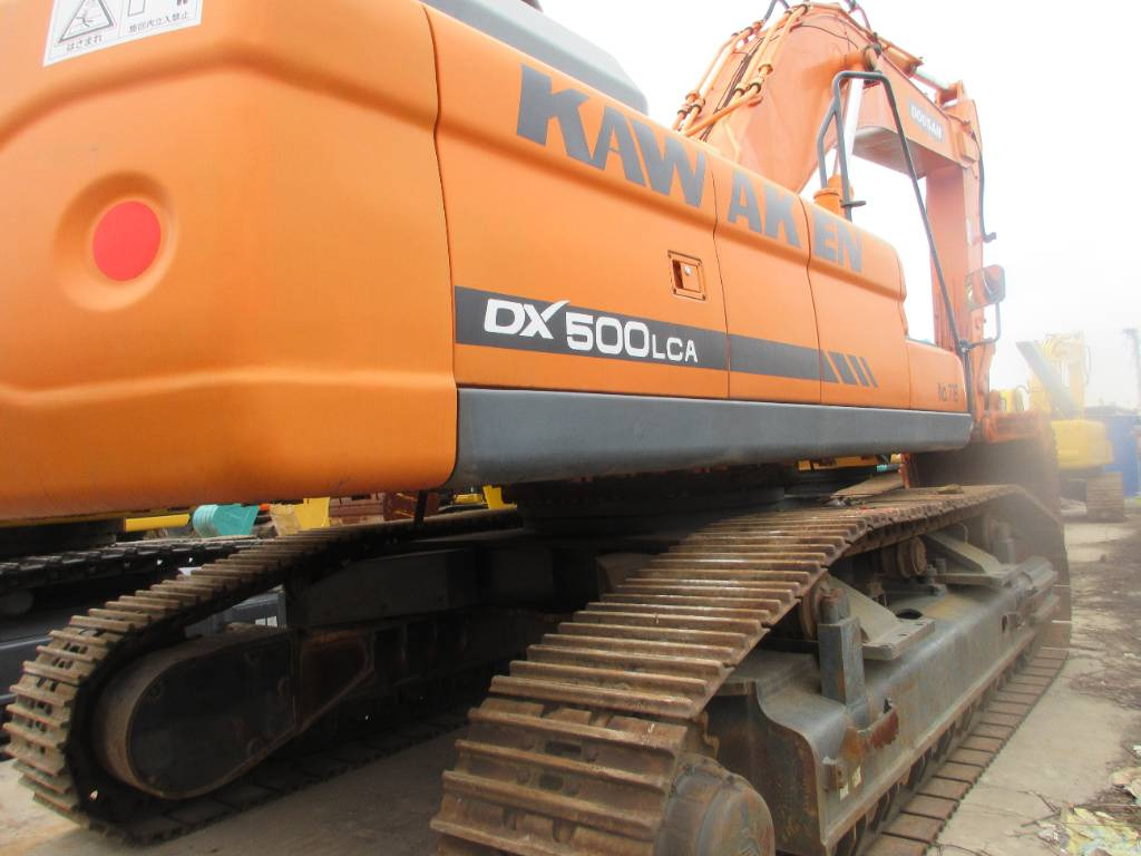 Doosan DX 500 LCA - Kāpurķēžu ekskavators: foto 2 Doosan DX 500 LCA - Kāpurķēžu ekskavators: foto 2