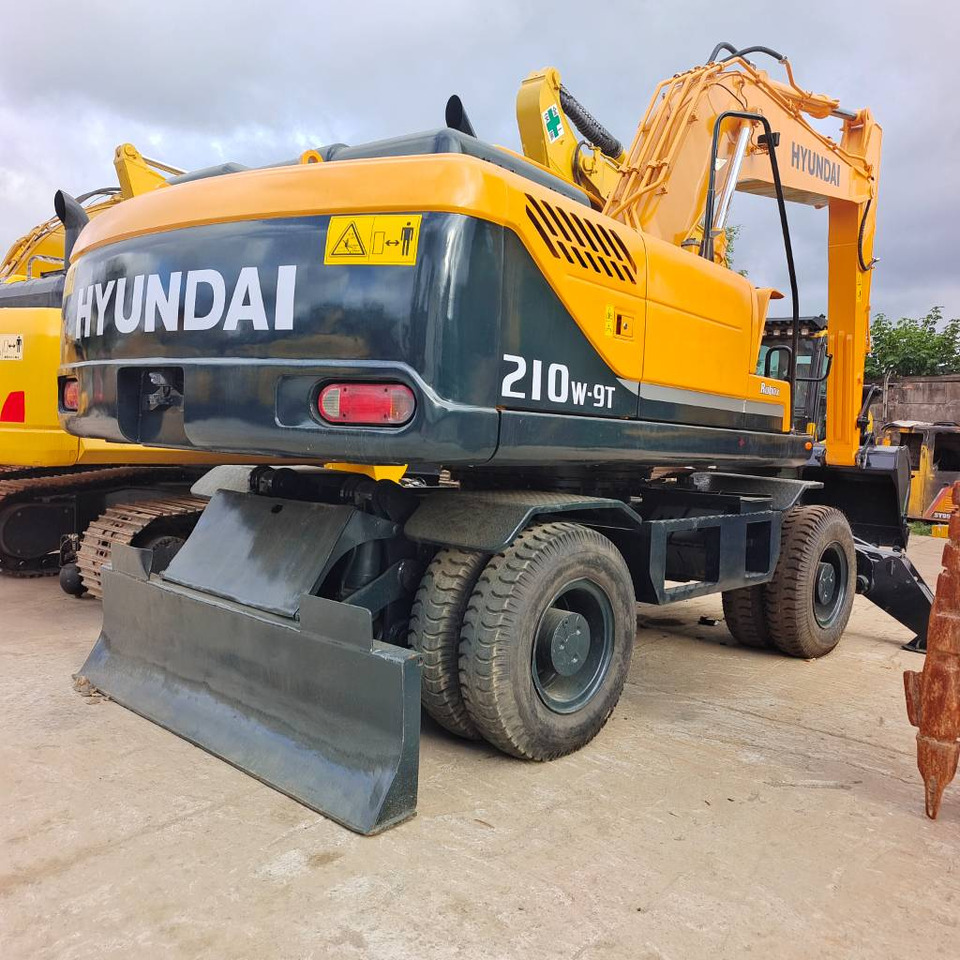 Hyundai 210W-9 - Riteņu ekskavators: foto 4 Hyundai 210W-9 - Riteņu ekskavators: foto 4