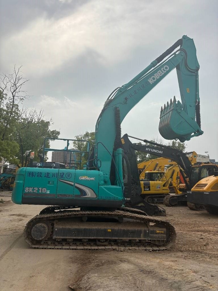 Kobelco SK 210 - Kāpurķēžu ekskavators: foto 3 Kobelco SK 210 - Kāpurķēžu ekskavators: foto 3