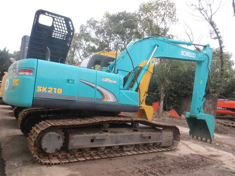 Kobelco SK 210 - Kāpurķēžu ekskavators: foto 1 Kobelco SK 210 - Kāpurķēžu ekskavators: foto 1